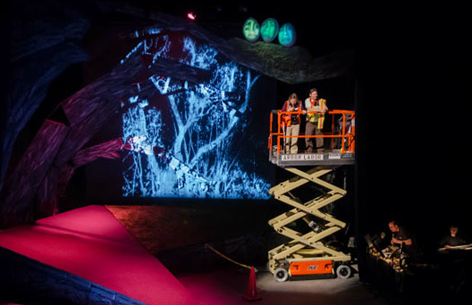 Lia and Gus on the Cherry Picker search for the lost boy as the Tree Children watch.